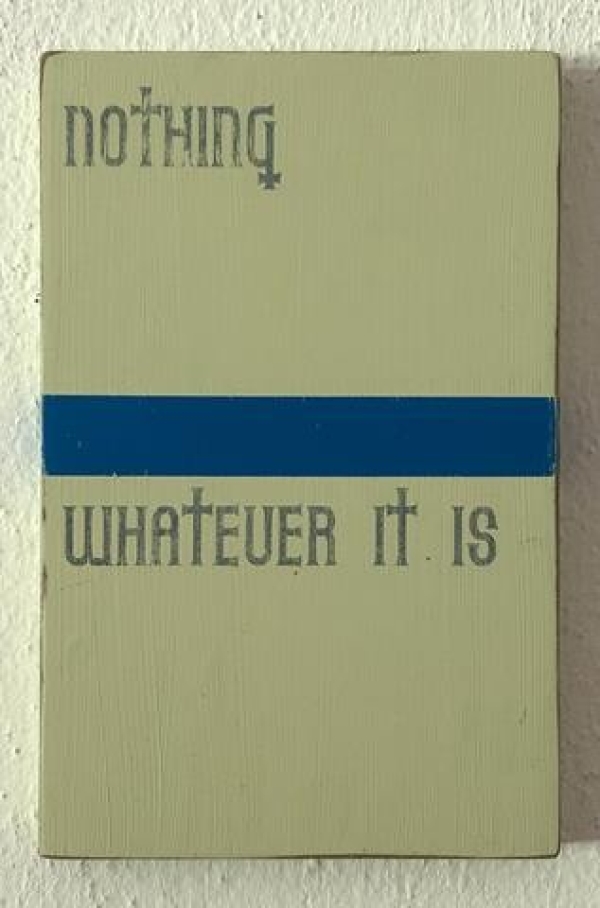 Sign with the words ‘Nothing whatever it is’