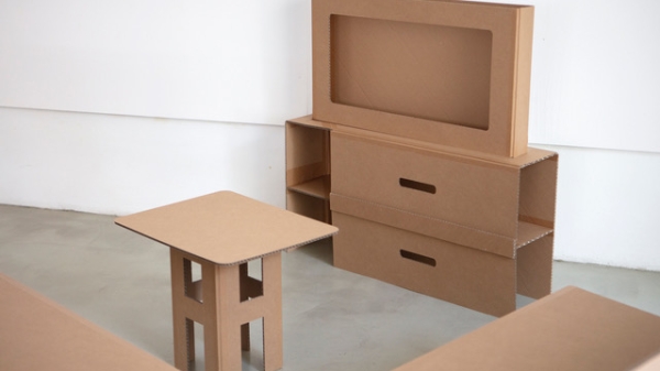 A table and TV made of cardboard